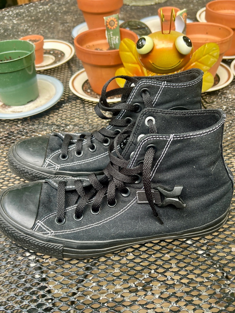 Converse All Stars with buckles. Size L9. Barely worn.